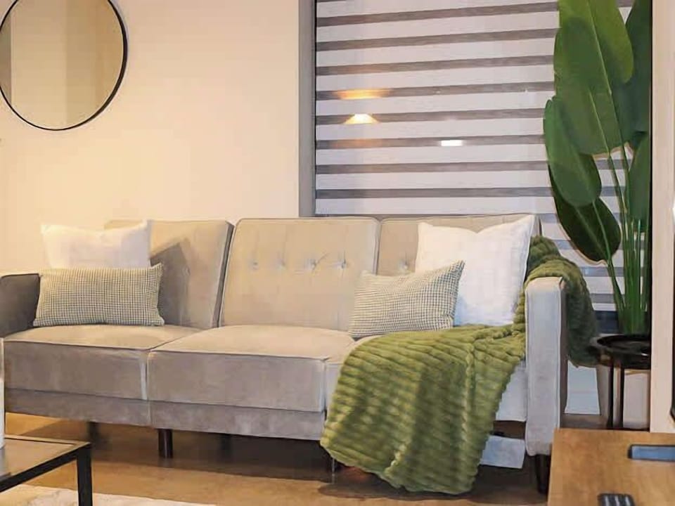 Perfect for spending time together, the open-plan living area integrates the lounge, kitchen, and dining space into one bright room. Enjoy comfortable seating, entertainment on the Smart TV, and flexible sleeping arrangements with two sofa beds.