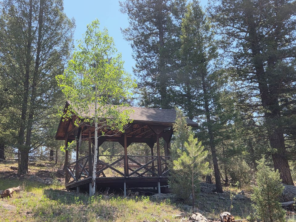 A quiet gazebo set away from the cabin.