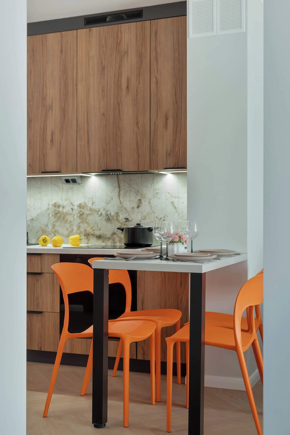 Kitchen detail showcasing modern appliances and stylish work surfaces.