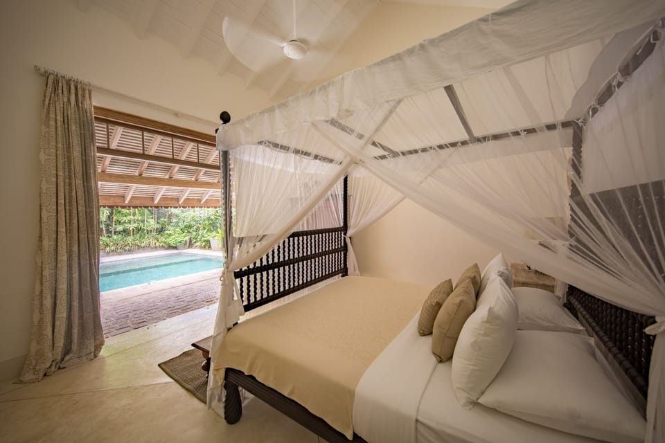 Deluxe Pool Room | Premium bedding, minibar, in-room safe, individually decorated