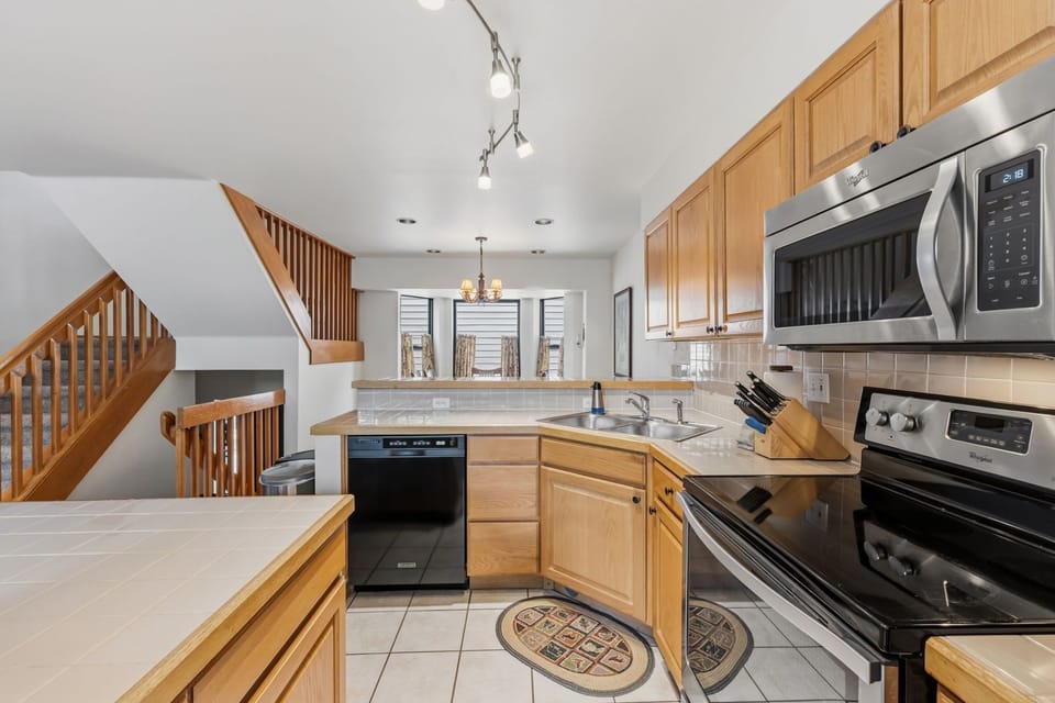 Your fully equipped kitchen awaits with modern appliances, ample counter space, and everything you need to prepare delicious home-cooked meals during your stay.