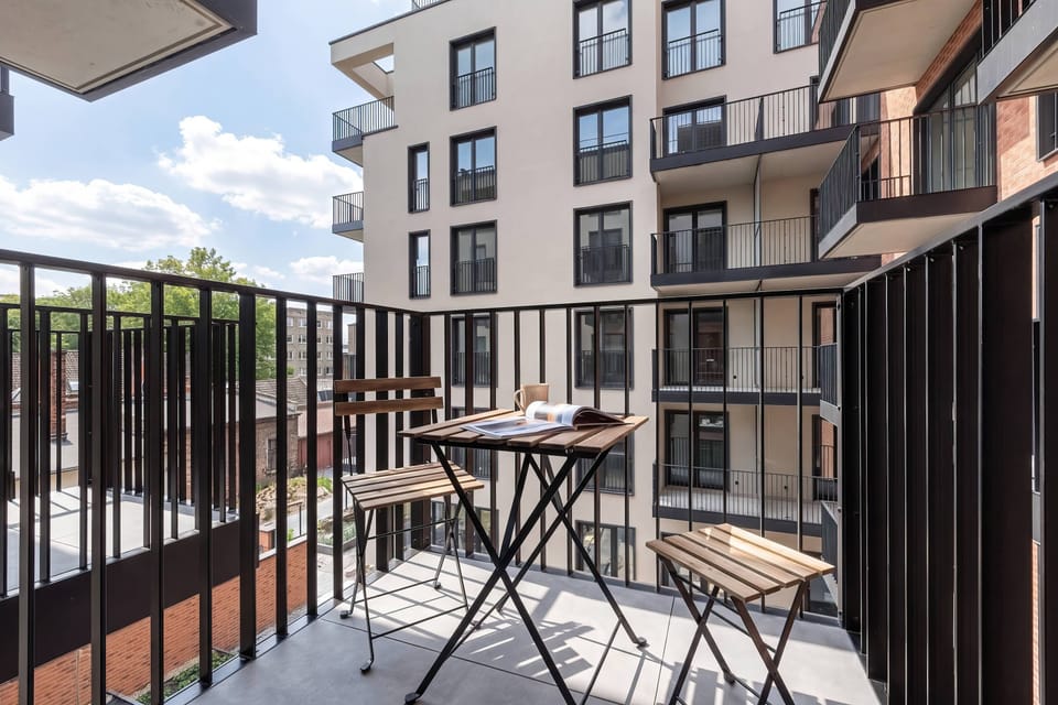 The balcony provides a perfect spot for enjoying the fresh air.