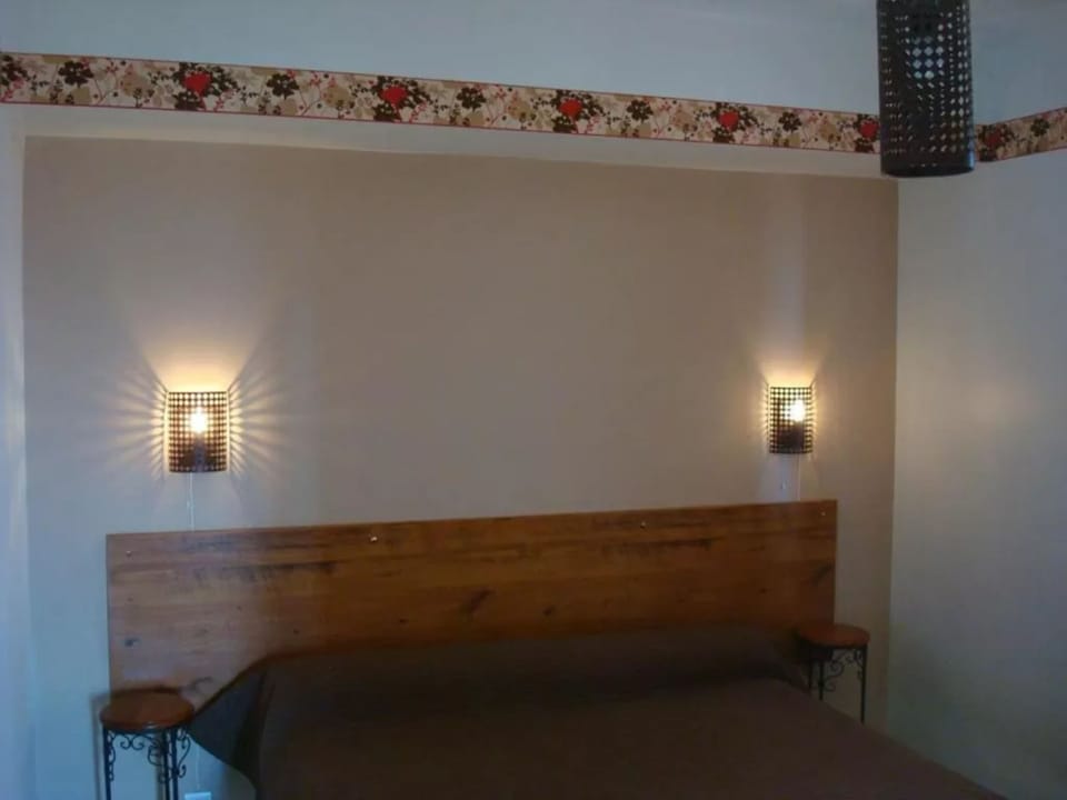 Quadruple Room | Desk, iron/ironing board (on request), cribs (free), bed sheets