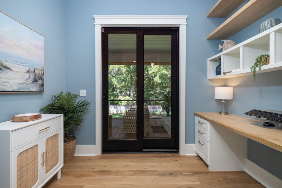 Access the screened-in deck from your primary king bedroom