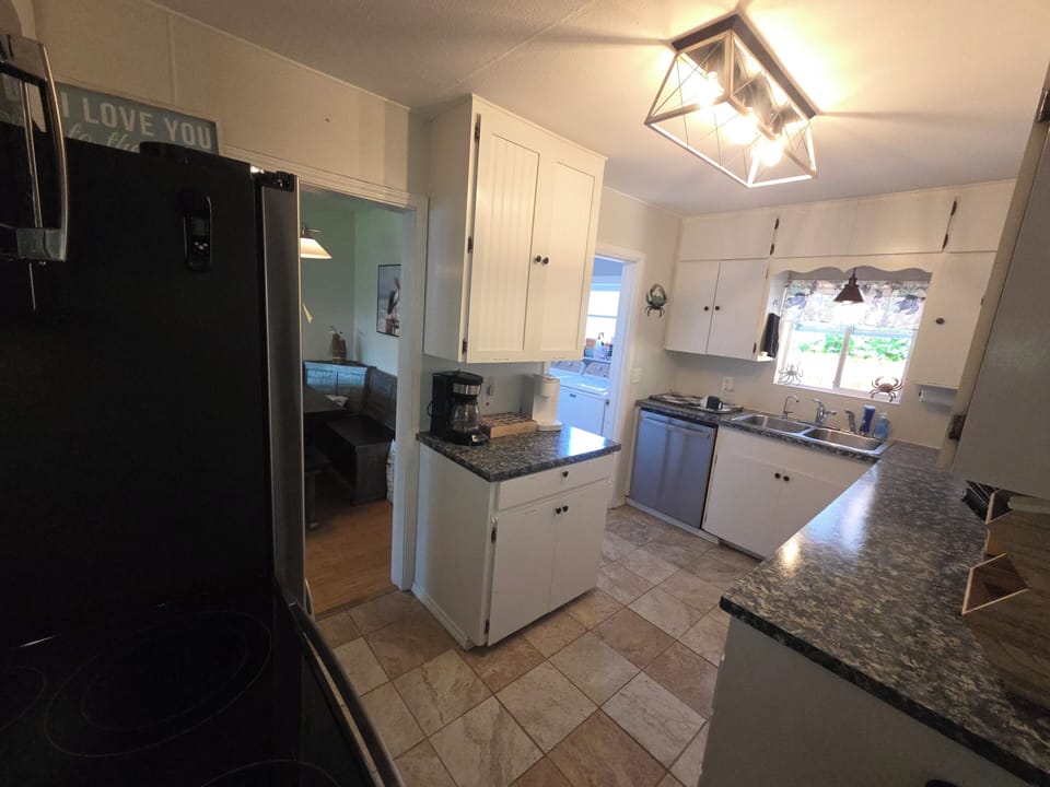 Bright & Functional Kitchen – Thoughtfully designed with plenty of prep space.