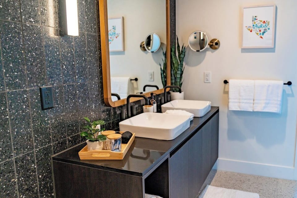 Luxurious terrazzo tile surrounds you in your spa inspired European style En Suite bathroom!