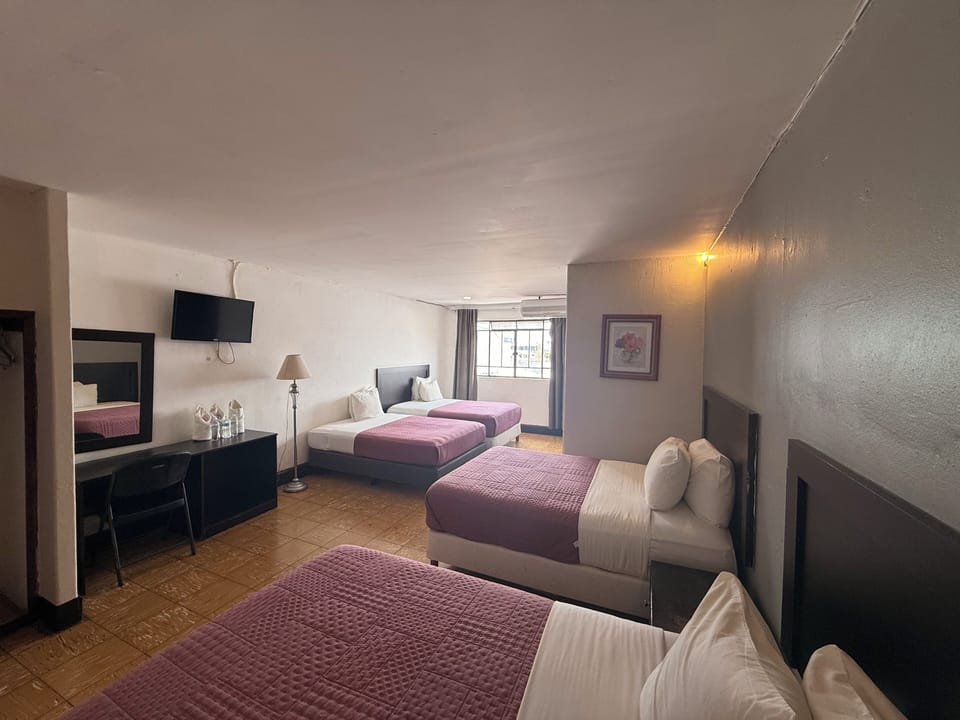 Basic Quadruple Room | WiFi (free), bed sheets