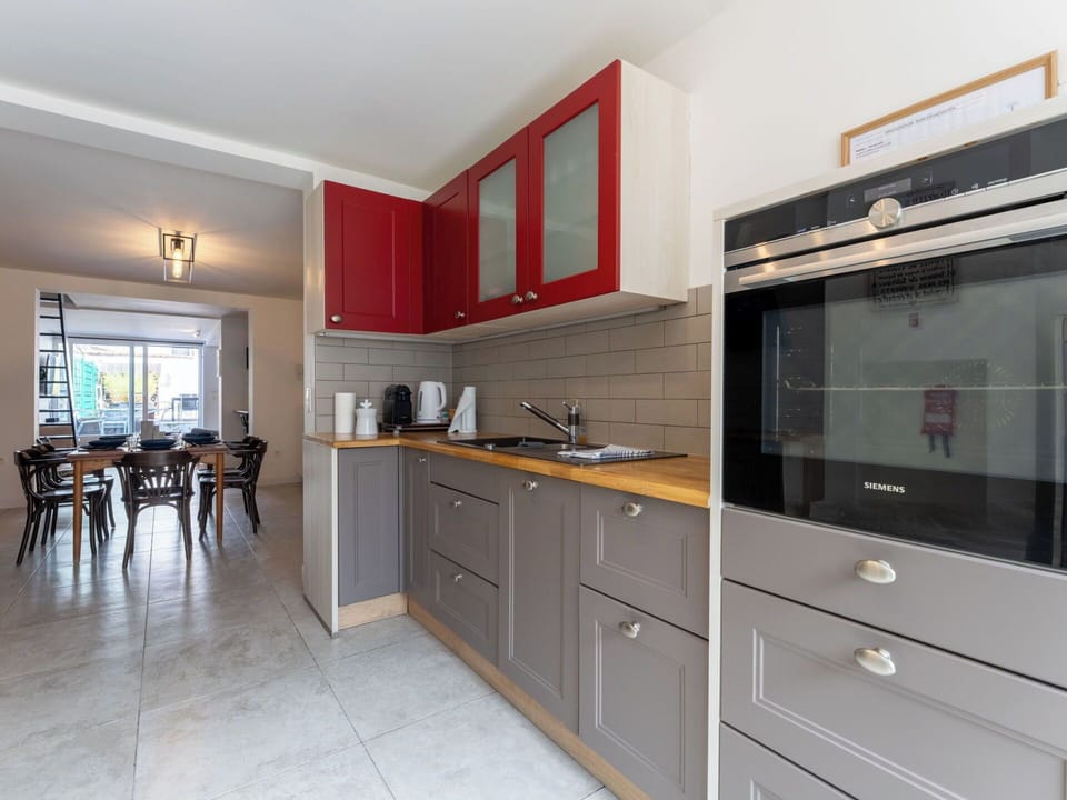 Kitchen, Countertop, Kitchen Appliance, Cabinetry, Flooring, Major Appliance, Interior Design, Wood, Furniture, Floor