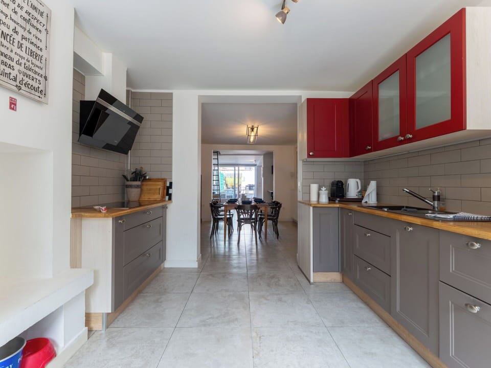 Kitchen, Countertop, Flooring, Interior Design, Furniture, Wall, Cabinetry, Wood, Floor, Kitchen Appliance
