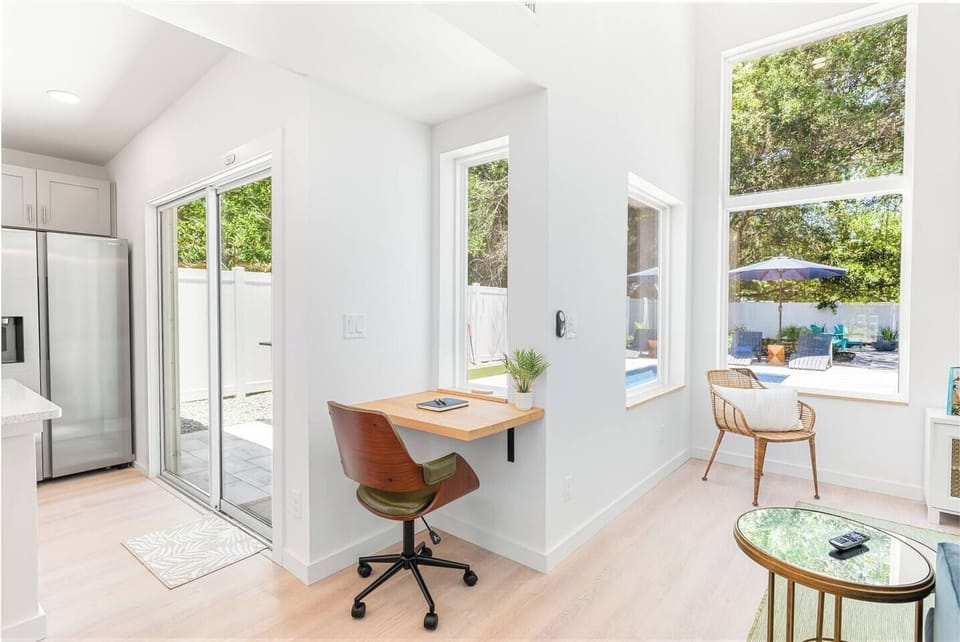 Work remotely in style with high-speed WiFi and a bright, serene desk space overlooking the private pool