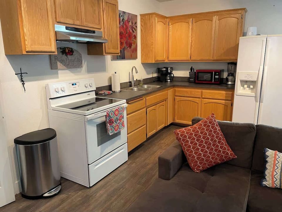 Both a Keurig and Drip coffee maker along with a blender, toaster, hot water boiler and a microwave are among the conveniences available in the kitchen. Even the fridge has a water and ice dispenser.