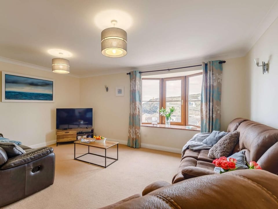 Comfortable living space on the first floor with sea views to admire