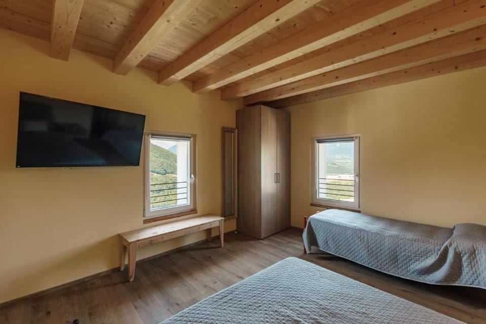 Deluxe Quadruple Room, Mountain View | Blackout drapes, WiFi (free), bed sheets
