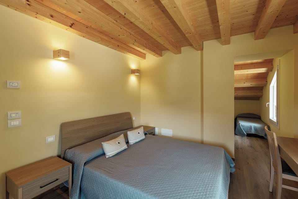 Comfort Quadruple Room, Mountain View | Blackout drapes, WiFi (free), bed sheets