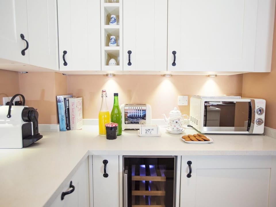 Well-equipped kitchen complete with Nespresso and wine chiller