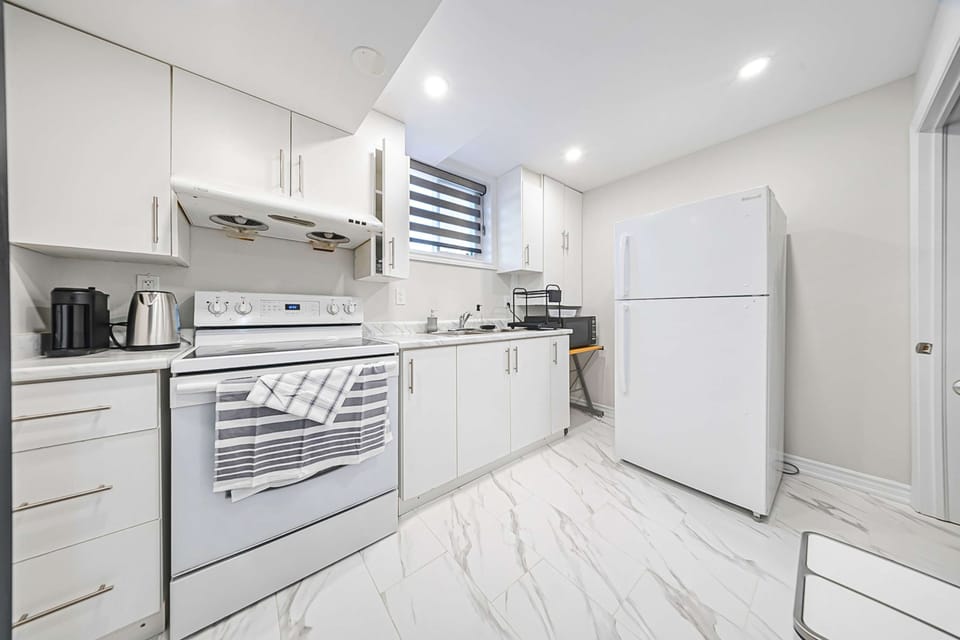 Kitchen area and sink, offering everyday convenience