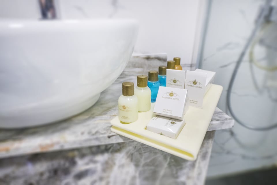 Shower, free toiletries, hair dryer, slippers