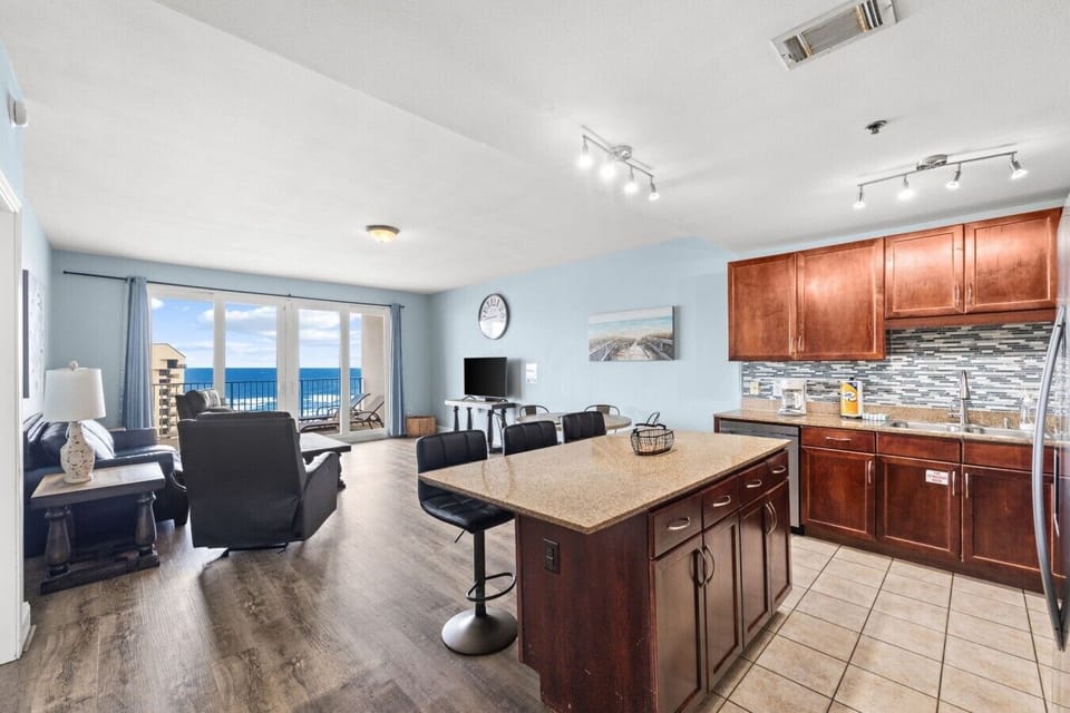 Fully Stocked Kitchen with Stainless Steel Appliances, Island Bar Seating and Drip Coffee Maker