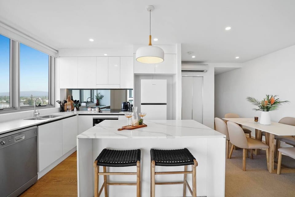Settle into the kitchen for breakfast at the island stools before preparing meals with everything needed for easy holiday cooking close at hand.