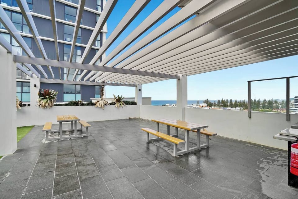 Enjoy the shared rooftop, where the communal BBQ and open-air seating provide another spot to dine while soaking up the sea breeze.