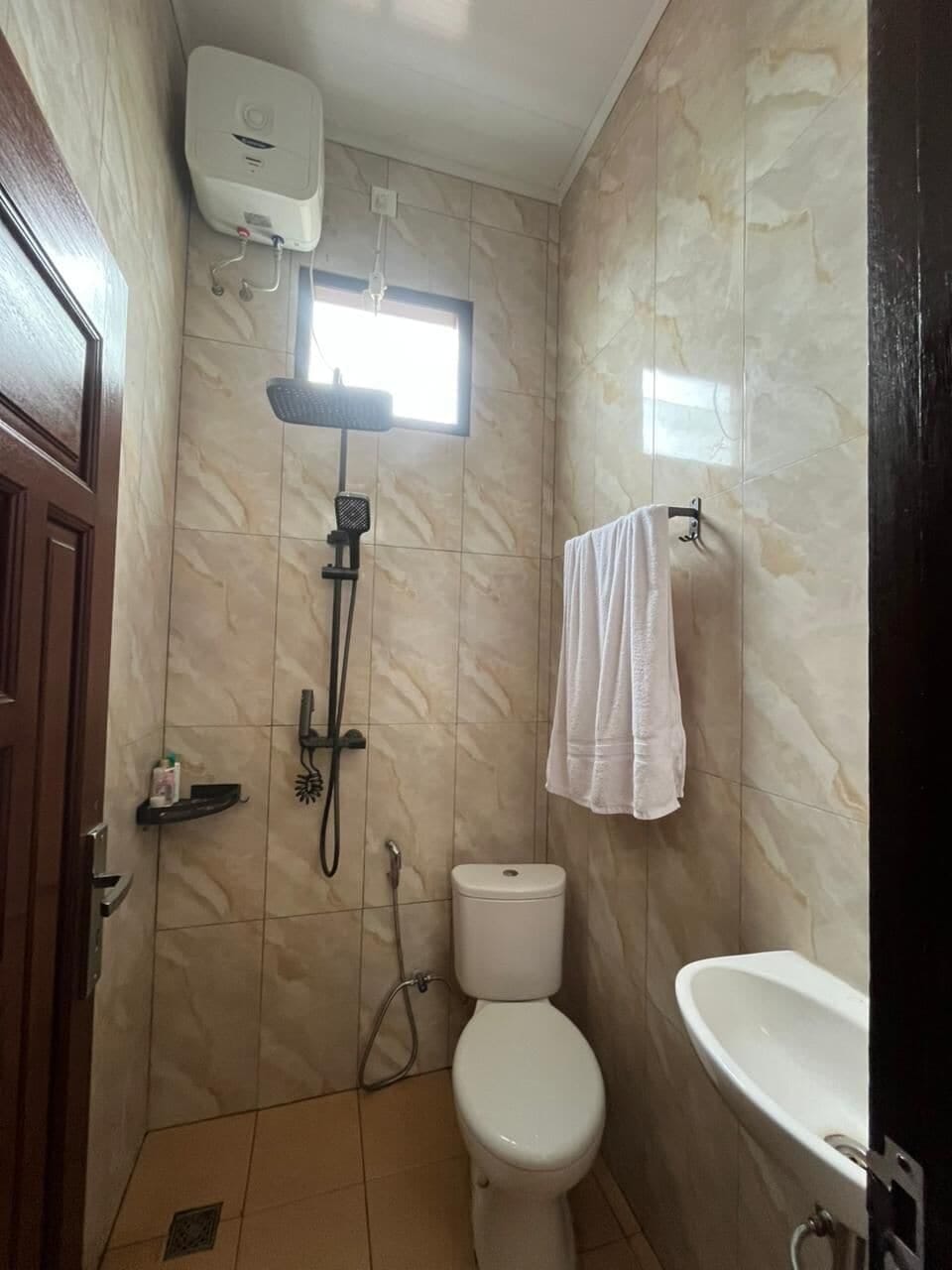 Deluxe Double Room | Bathroom | Shower, towels, soap, toilet paper