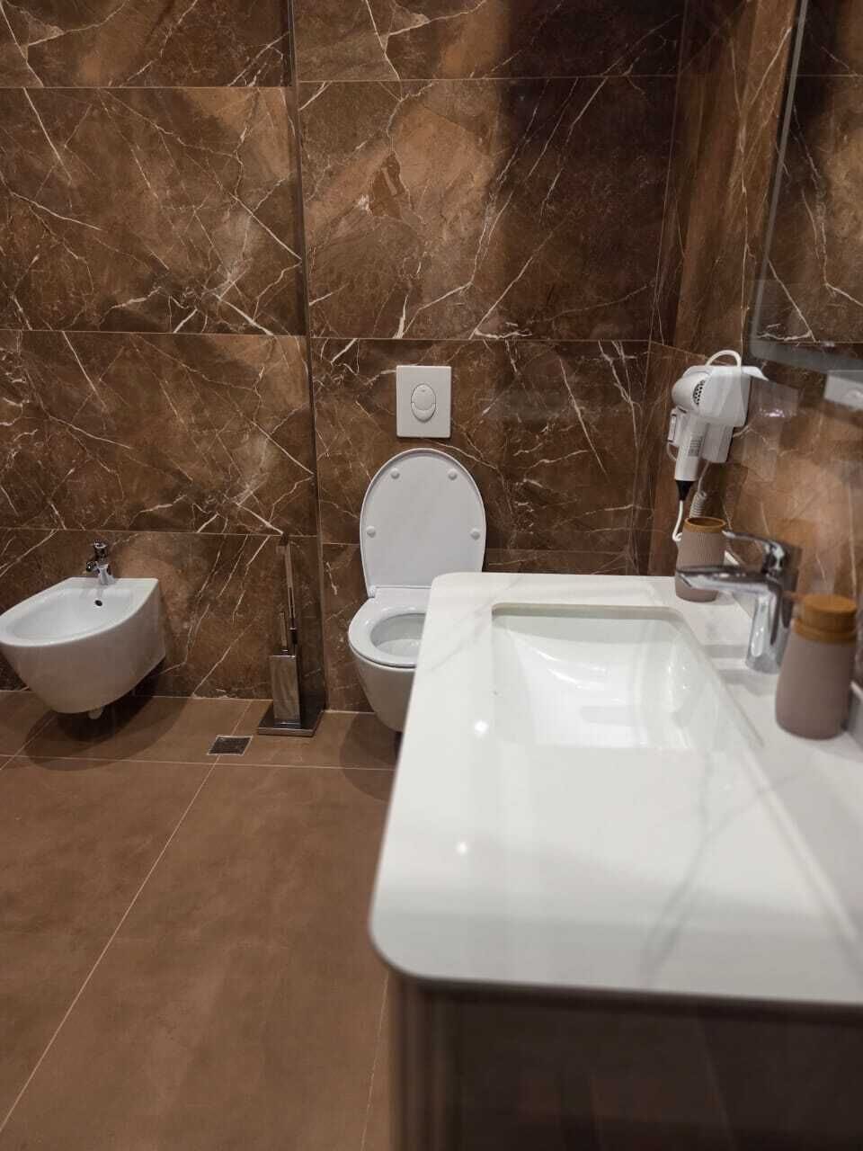 Hair dryer, towels, soap, shampoo