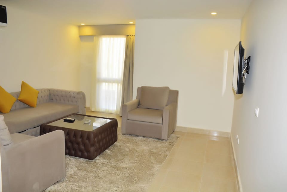Family Suite, Sea View | Living area | LCD TV
