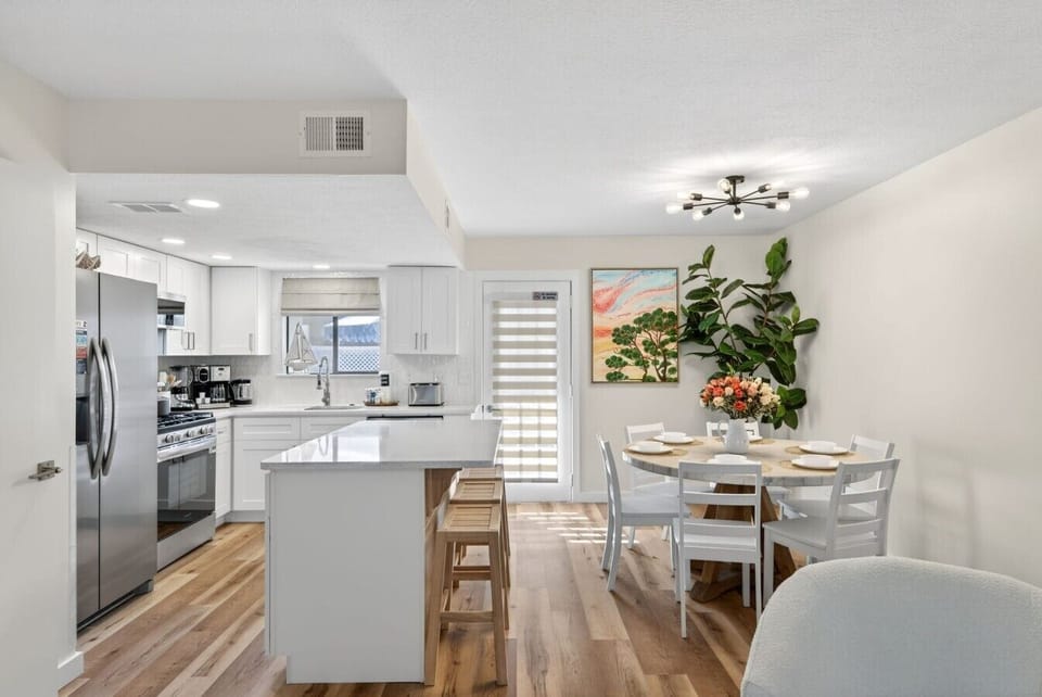 Kitchen & Dining Area | Kitchen Island | Stainless Steel Appliances & Dining Seating