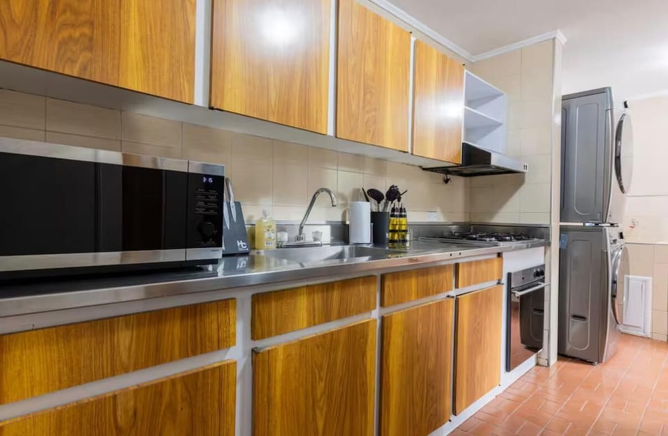 Full Kitchen and laundry area.