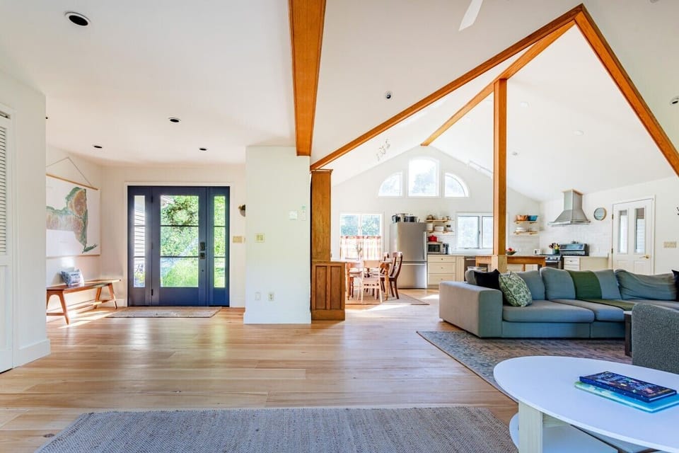 Step inside to soaring vaulted ceilings, an open-concept layout, and a warm, welcoming atmosphere