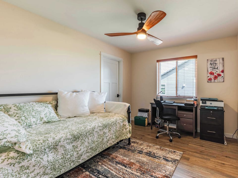 The second bedroom features a trundle bed that has an additional twin bed or can be converted into a king bed. There is a large walk in closet and office space. 