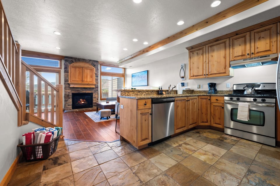 Fully equipped kitchen with everything needed for meals, snacks, and family gatherings.