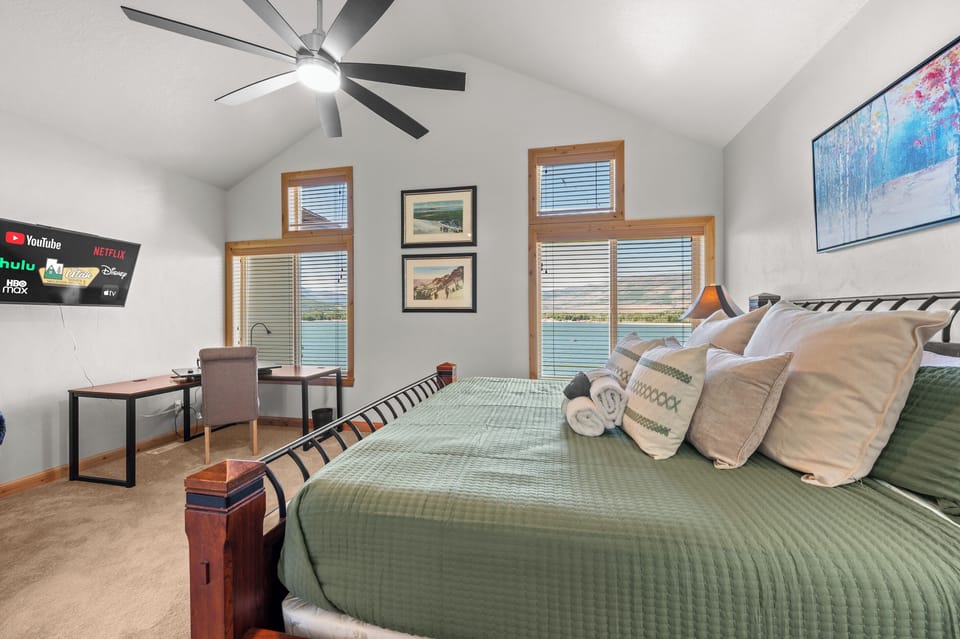 Spacious primary suite combining comfort, scenery, and functionality.