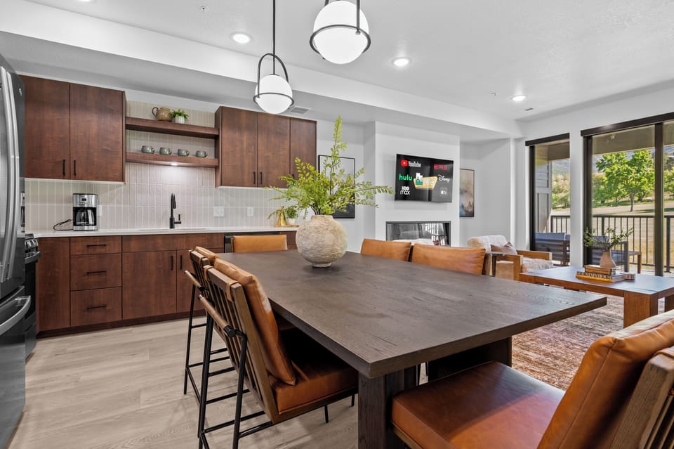 Open kitchen and dining area designed for entertaining and family meals.