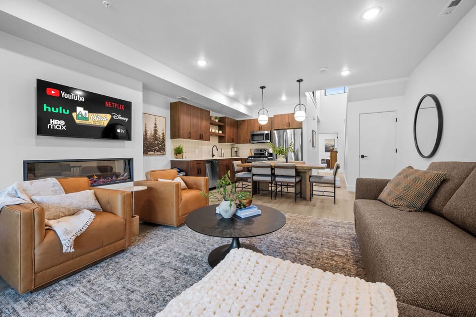 The open floor plan makes it easy to cook, dine, and relax together.