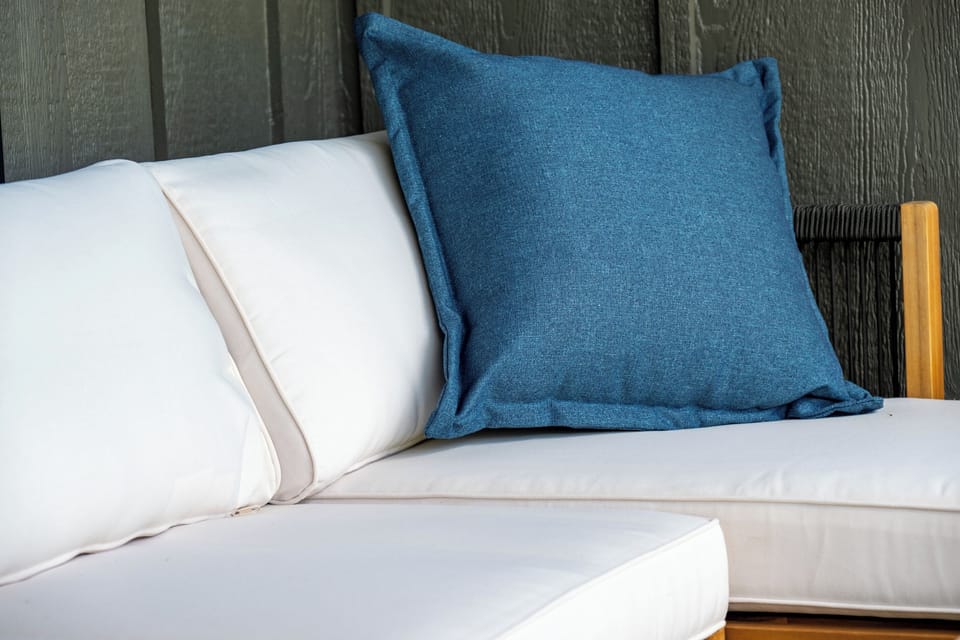 Comfortable outdoor seating with views across Wolf Creek Golf Course.