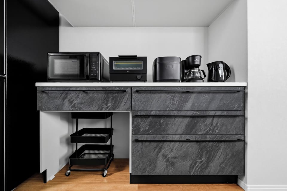 Apartment | Private kitchen | Coffee/tea maker, fridge, microwave, stovetop