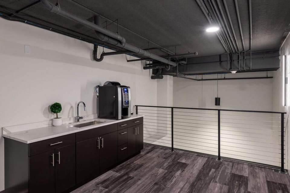The perfect spot to mingle: the mezzanine lounge features a pool table, complimentary coffee, and plenty of space to work or relax