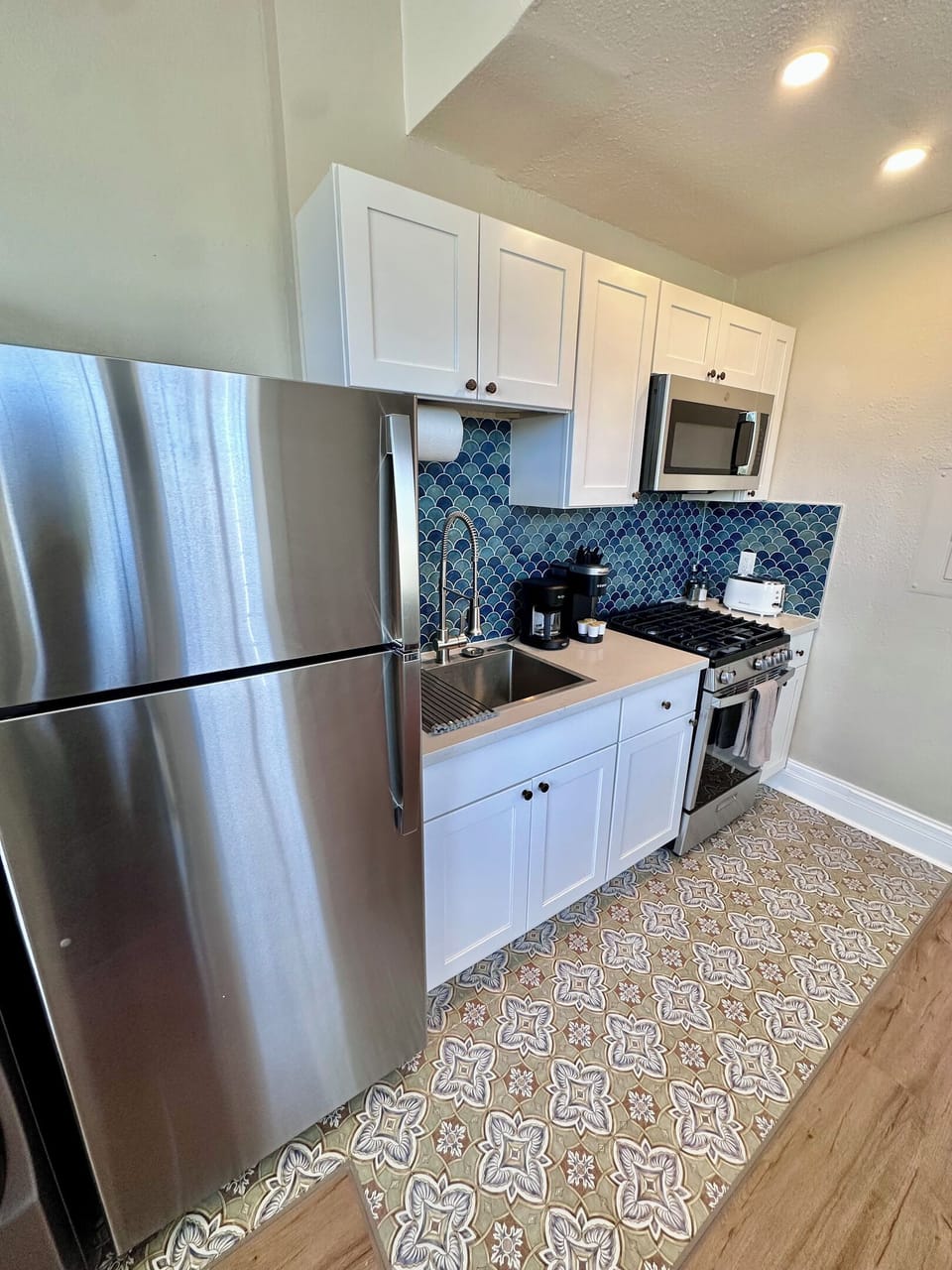 Enjoy the convenience of a private, fully equipped kitchen—perfect for whipping up a meal or a morning coffee.