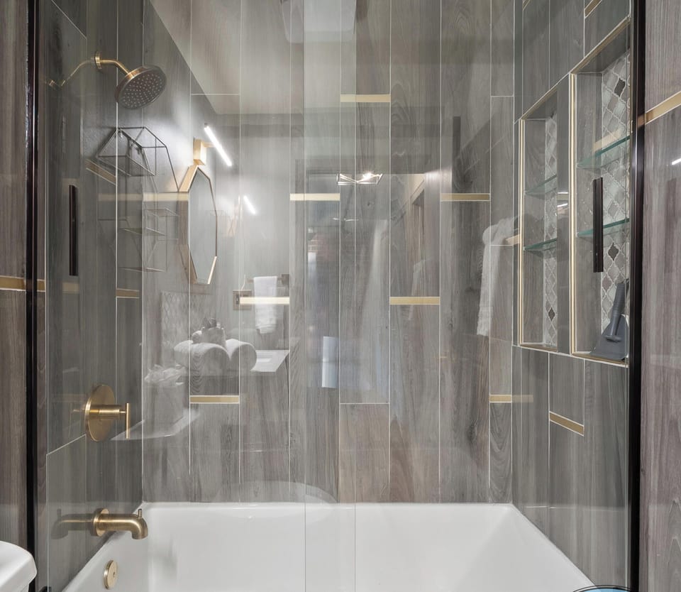 Full bathroom with tub/shower combo. Shared Bathroom.