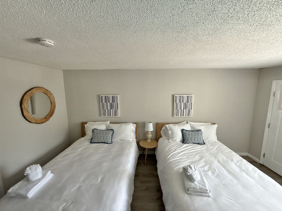 hotel style unit with 2 queen beds