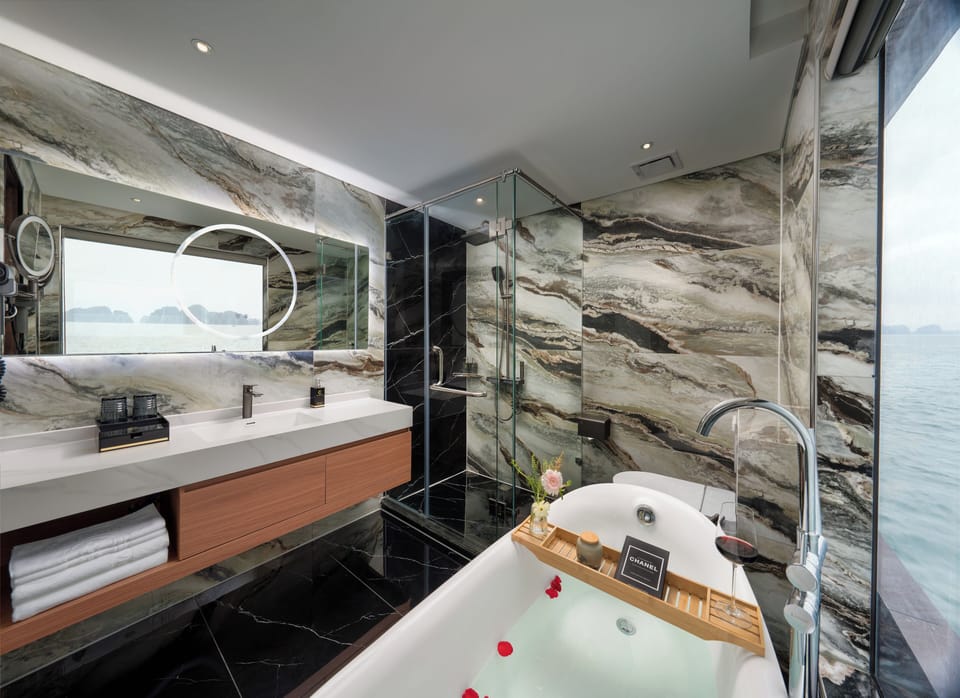 Suite, 1 King Bed, Ocean View | Bathroom | Free toiletries, hair dryer, slippers, towels