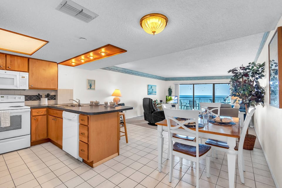Open layout view from the kitchen all the way to the blue water