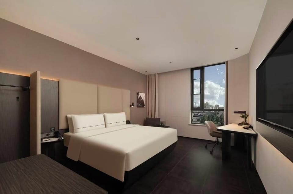 Premium bedding, down comforters, memory foam beds, minibar (free items)