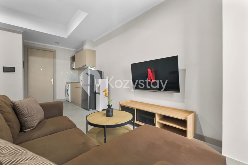 Apartment, 2 Bedrooms, Balcony, City View | Living area | 50-inch Smart TV with cable channels, Netflix, streaming services