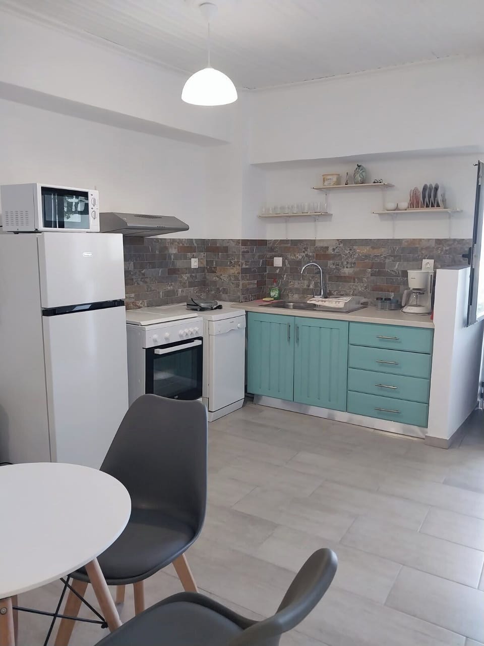 Fully Equipped Kitchen with Dining Area