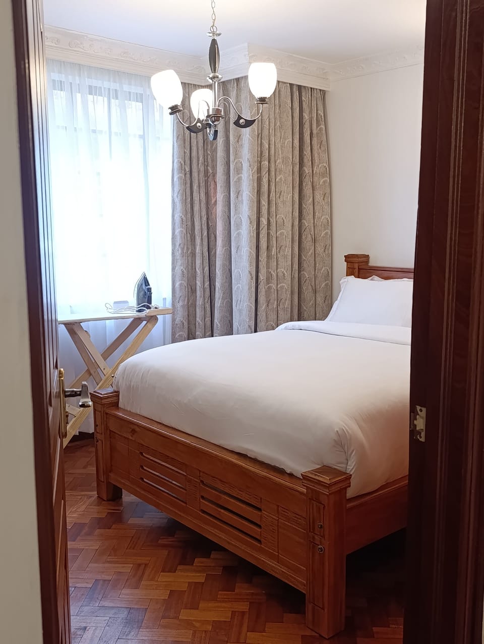 Comfort Apartment, Balcony, City View | Iron/ironing board, WiFi (free), bed sheets