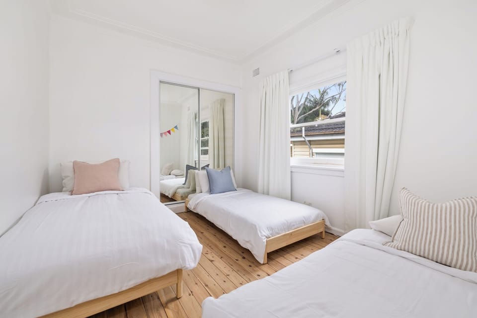 Upstairs bedroom as three singles