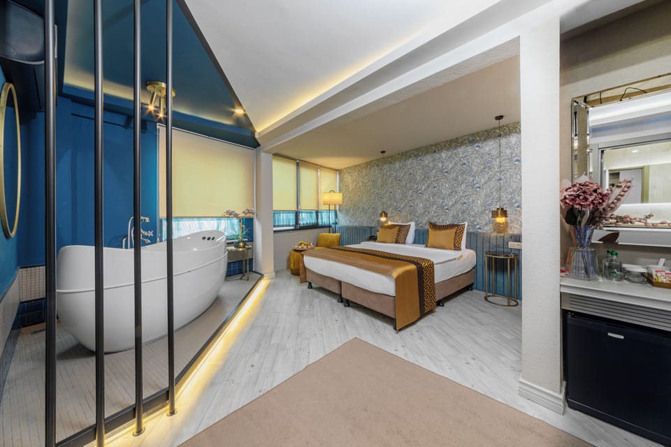 Executive Suite with Jacuzzi and Hammam | Premium bedding, minibar, in-room safe, iron/ironing board