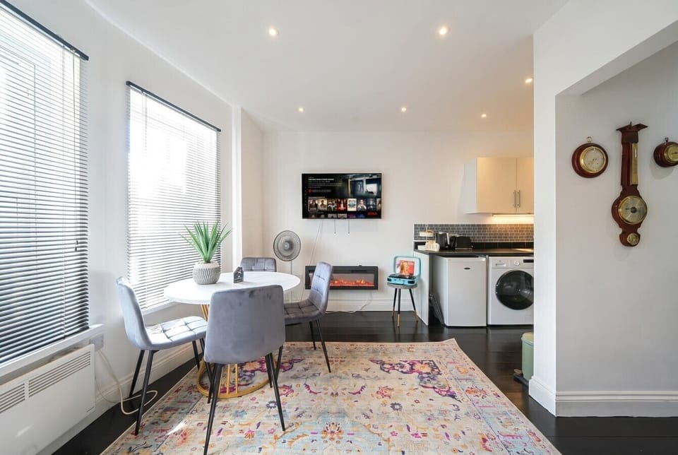 Clever layout linking kitchen, dining and lounge under bright windows